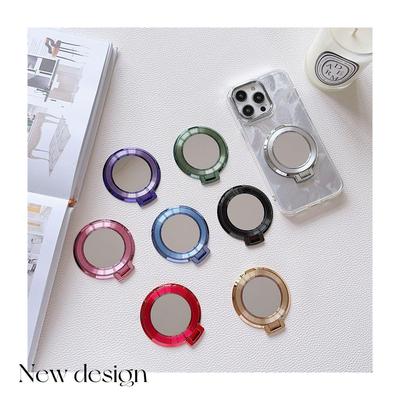 Ultra-thin Magnetic Ring Stand with CD Pattern for Mobile Phones - Foldable, Adhesive, and MagSafe Compatible.
