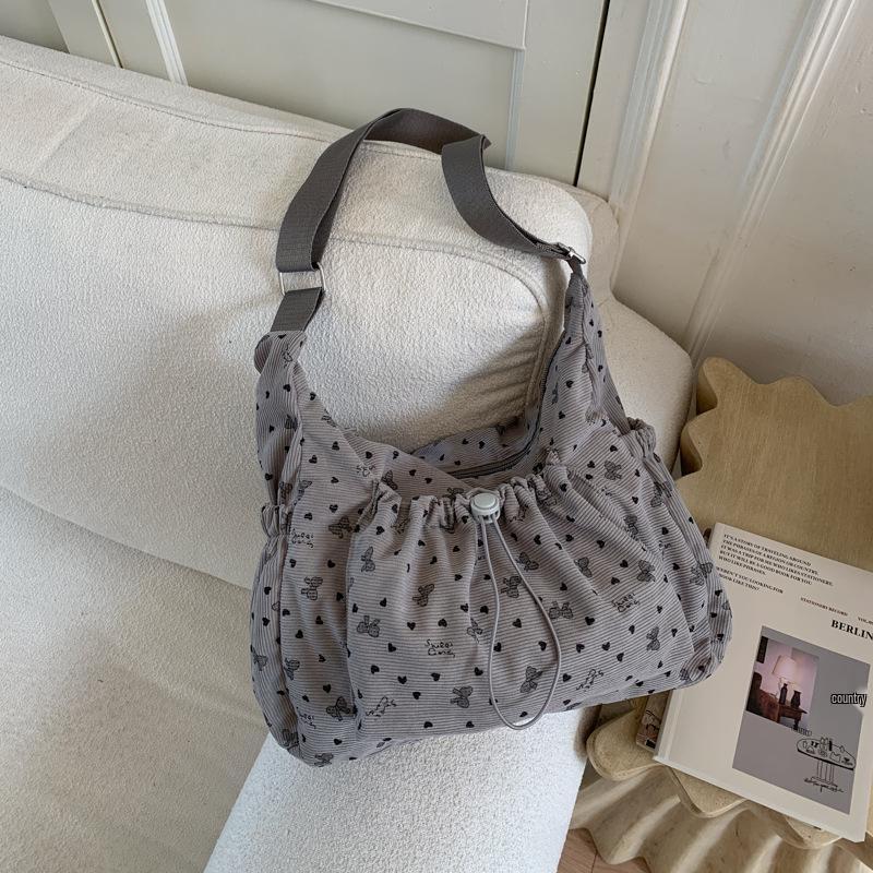 

2025 Korean Style Plaid Drawstring Cloud Bag: Large Capacity Backpack, Shoulder & Crossbody Women s Bag