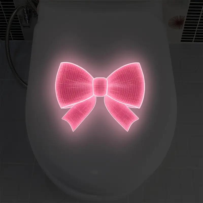 

Светящиеся в темноте наклейки для украшения туалета, светящаяся наклейка на крышку унитаза, дизайн с розовым бантом, ПВХ украшение для стены крышки унитаза 1pc