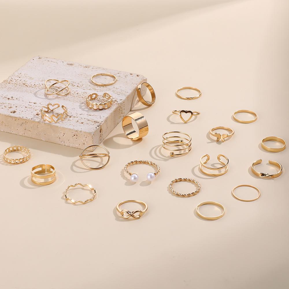 New Fashion Gold Pearl Love Butterfly Cross Hollow Opening 22-piece Suit Ring