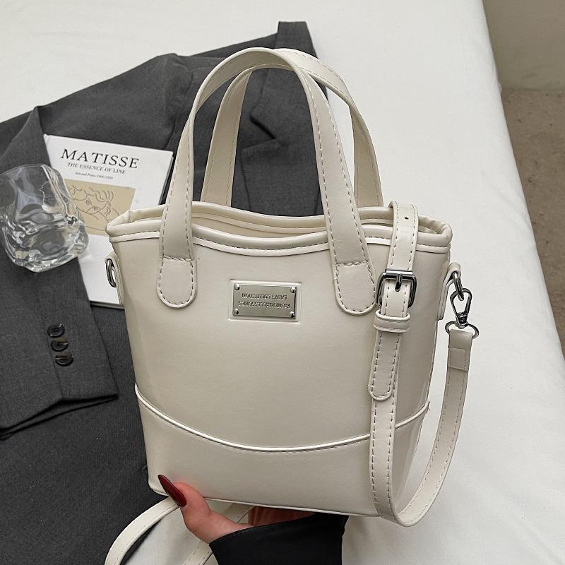 Koreańska wersja popularnej prostej wysokiej jakości koreańskiej przenośnej torby-wiadra modna wszechstronna styl commuter miejski casualowa torba listonoszka damska