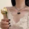 "European & American Double-Layer Love Necklace: Hip-Hop Inspired Long Sweater Chain for Women"