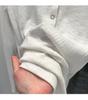 T-shirt rayé à boutons-pression à manches longues pour femme, léger et professionnel, couche de base amincissante pour l'automne/l'hiver/le printemps.