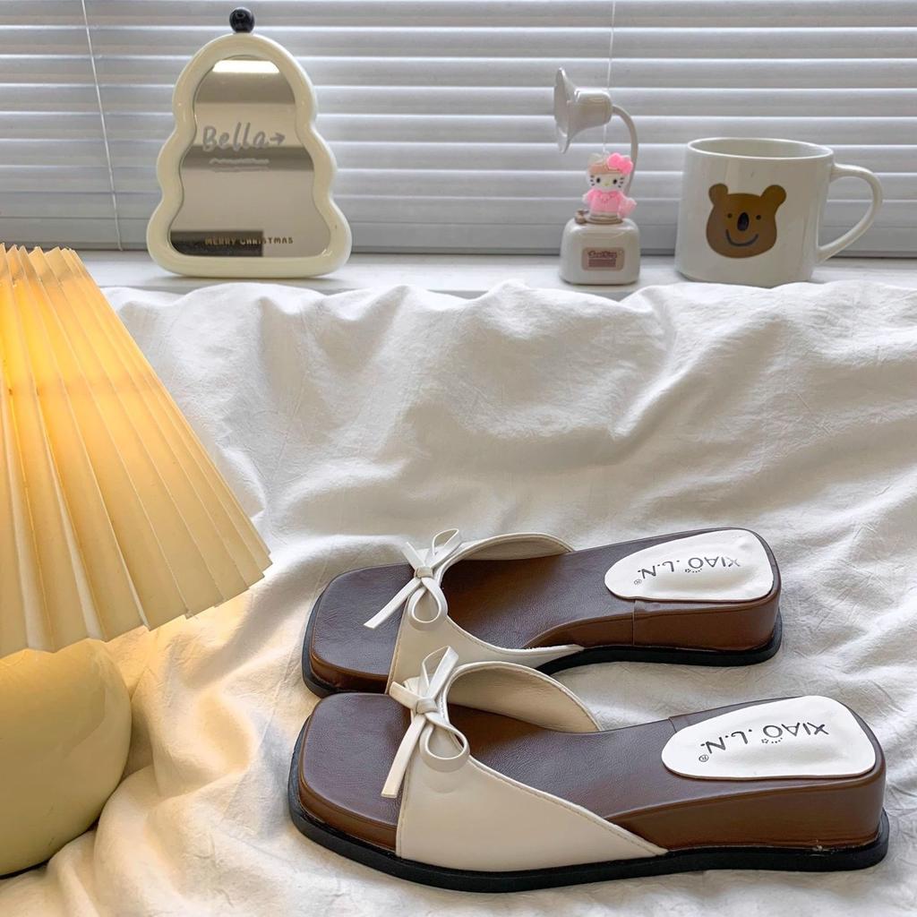 French temperament versatile bow one-word drag 2025 summer new with skirt fashionable height increase thick bottom cool slippers