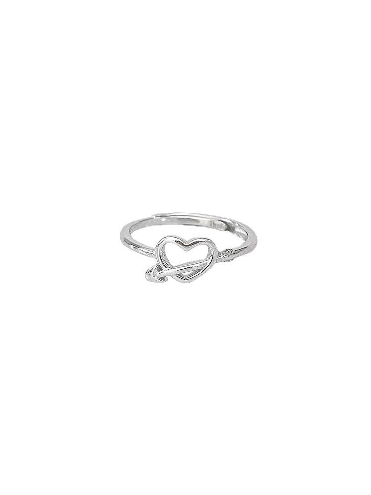 Elegant Heart-Piercing Ring for Women - Stylish Hollow Heart Design, Perfect for Engagement or Everyday Wear.