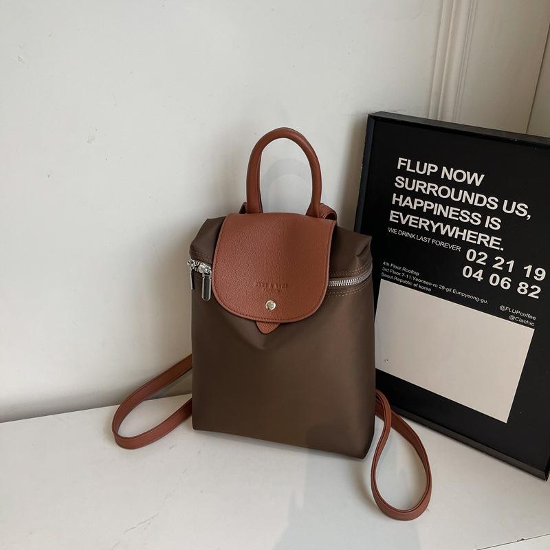 

2025 summer new women s nylon backpack folding bag travel waterproof wear-resistant large-capacity embroidered backpack