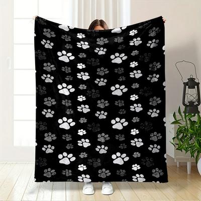 The Pattern Features White and Gray Animal Paw Prints On a Black Background. for All Seasons Blanket Lunch Break Throw Gift