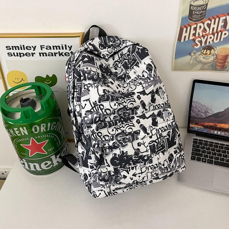 Schulrucksack Graffiti männlicher College-Student hohe Kapazität High School Mittelstufe Schüler Trendmarke Harajuku Trend Rucksack weiblich Ins Cool
