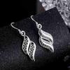 Zhenrong Geometric Hollow 925 Silver Drop Earrings with Feminine Design