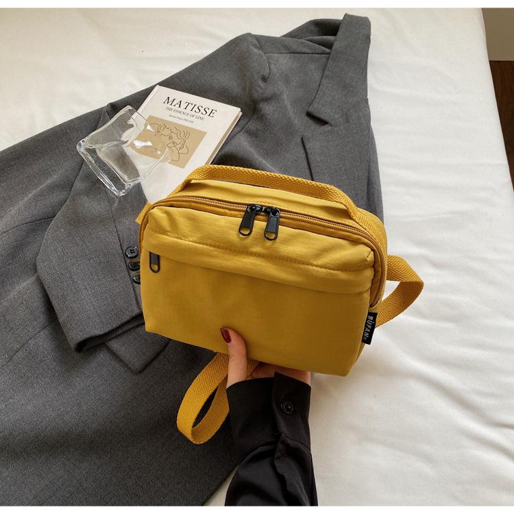 

Japanese lightweight messenger bag portable shopping shoulder bag diagonal back mobile phone bag travel couple simple popular bag жёлтый