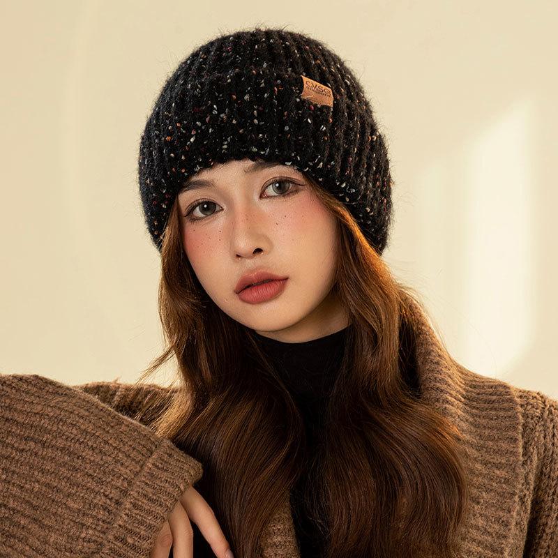 Small leather label dot knitted warm hat women's winter pullover ear protection cycling hat outdoor knitted straight hat
