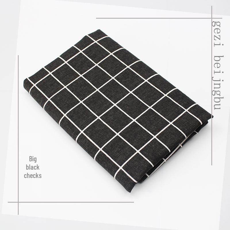 Черно-белая клетчатая ткань для сервировки стола и фуд-фотографии
