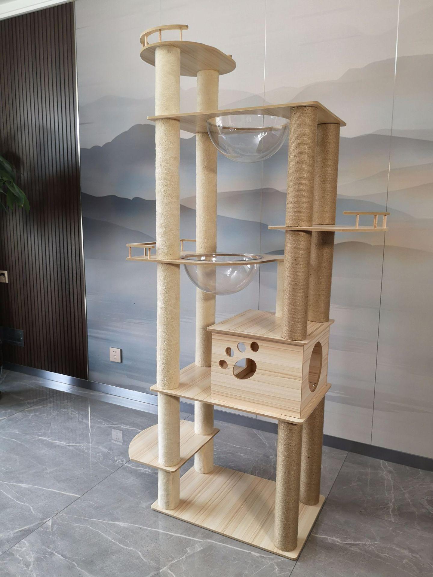 

Лазалка и лежанка для кошек - дерево с когтеточкой, подставкой для заточки когтей, платформой для прыжков и смотровой башней.