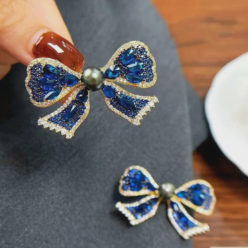 Exquisite Blue Bow Brooch: Gold-Plated Copper with Micro-Inlaid Zircon and Pearl