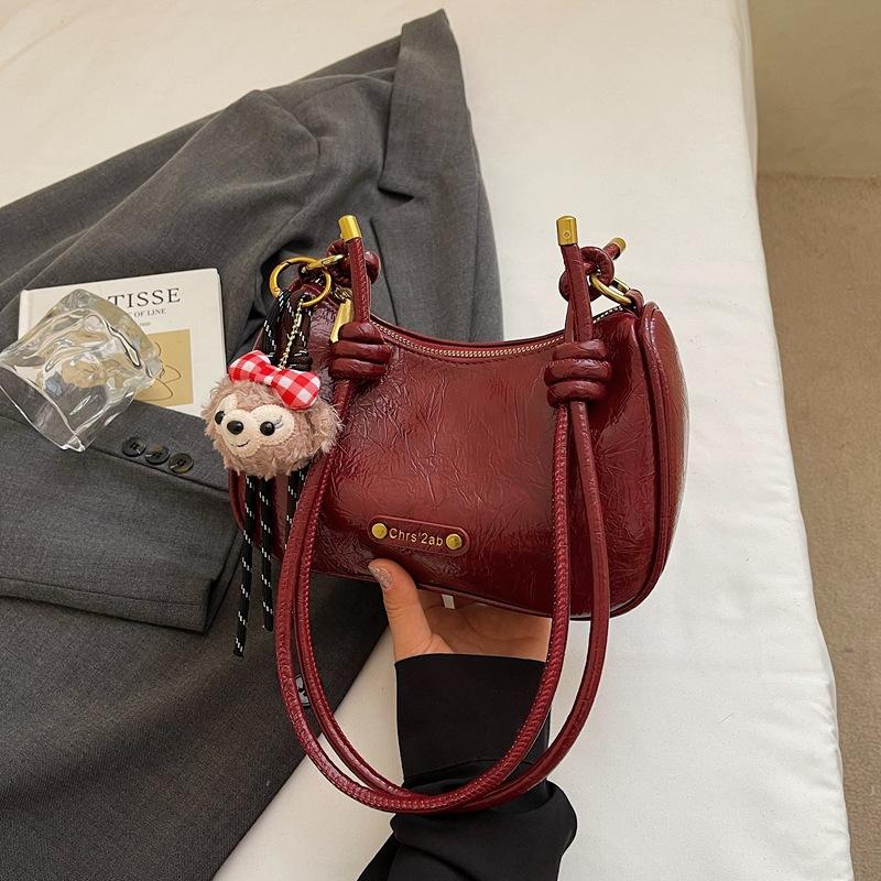 

French niche texture handbag women s bag 2025 autumn new armpit bag simple and fashionable commuter messenger bag бордовый