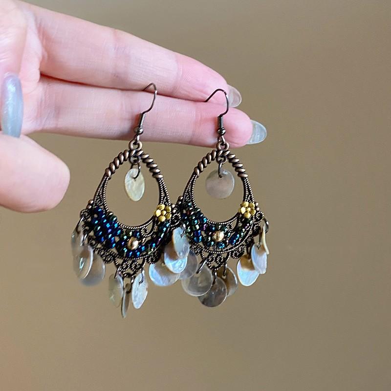Retro ethnic style round hollow earrings Bohemian temperament elegant earrings niche fashion light luxury earrings women