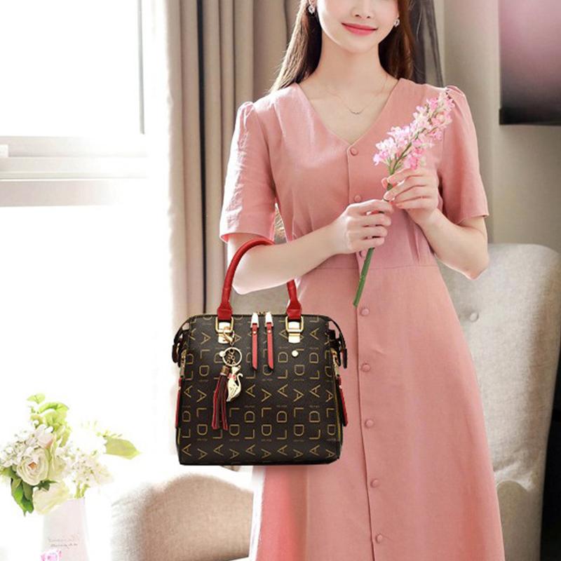 Stylish Womens Pu Leather Tote with Tassel Accent Top Handle and Shoulder Strap