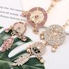 Rhinestone Dreamcatcher Keyring with Hollow Feather Pendant - Elegant Metal Gift