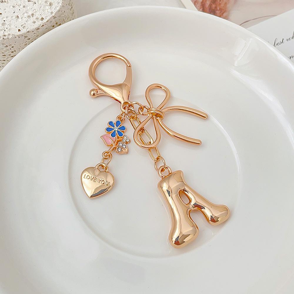 Популярный трансграничный брелок-бабочка: Элегантный металлический кулон с любовным посланием и инициалом L
