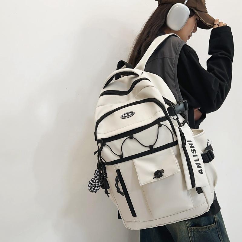 Cool locomotive Hong Kong style drawstring letter student school bag spring new large-capacity travel backpack