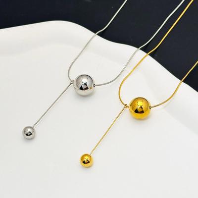 Golden Orb Titanium Steel Necklace: Light Luxury, Fade-Resistant, Niche Clavicle Chain with Pendant for Women