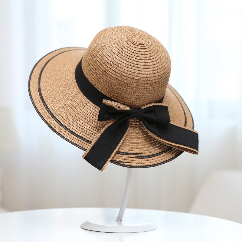 Women's Korean-style straw hat with large brim and bow, face-shading sun hat for outdoor beach use, UV protection, sun-proof straw fisherman hat