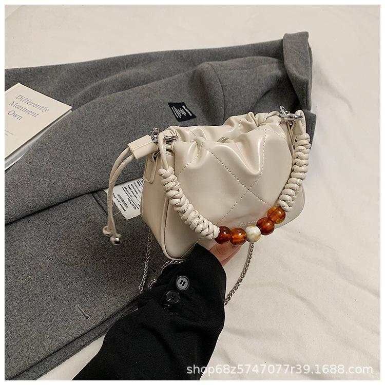 

Retro beaded hand bucket small bag women s national style wear shoulder bag 2025 spring drawstring pleated messenger bag