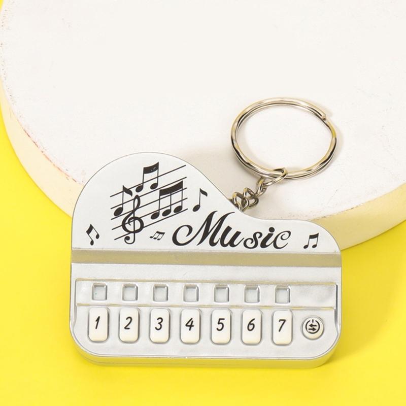 Klavierspielzeug Schlüsselanhänger Mini Echtes funktionierendes Fingerklavier Schlüsselanhänger Mit Lichtern Multifunktionales Elektronisches Klavier Tastatur Spielzeug