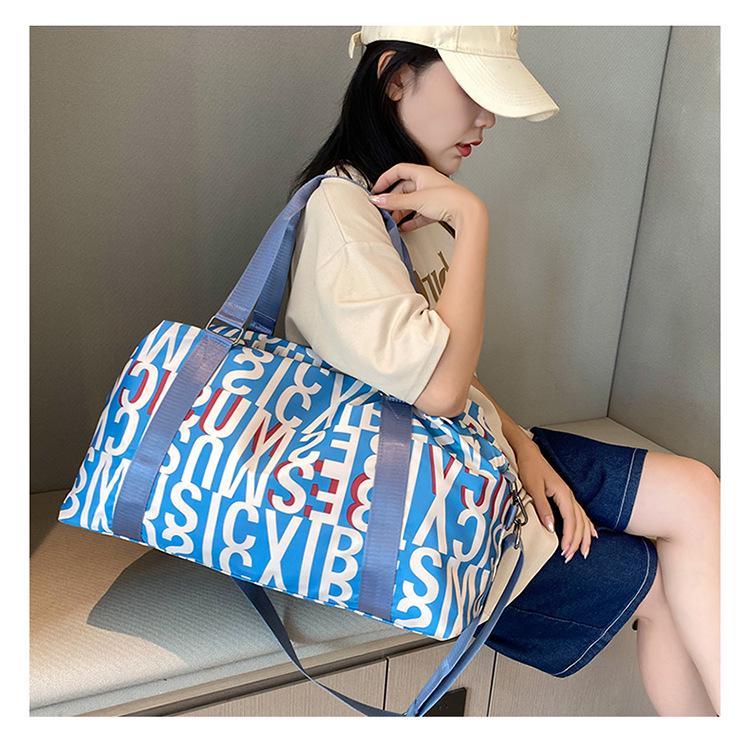 Multifunctional Yoga and Sports Travel Bag with Dry/Wet Separation, Large Capacity, and Trolley-Ready Design.