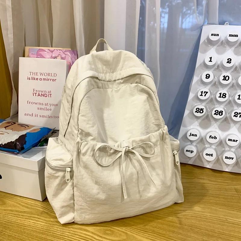 

New Student Backpack Women s Japanese Style Lightweight and Fashiable Backpack Solid Color Simple Bow Casual Travel Backpack білий