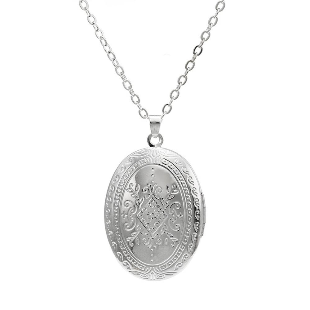 A romantic vintage oval carved photo frame pendant necklace openable photo box necklace suitable for women men wedding jewelry