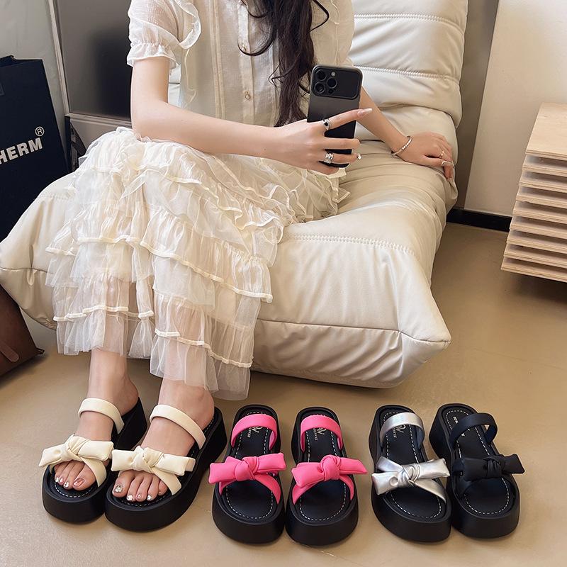 Bow one-word thick-soled slippers for women's summer wear 2025 new white heightening skirt cool slippers