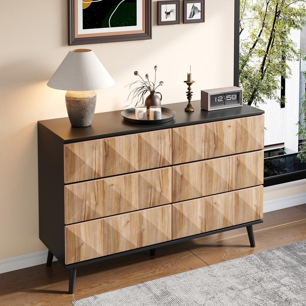 The sideboard and the dresser are characterized by a combination of black and natural wood tones as well as raised doors.