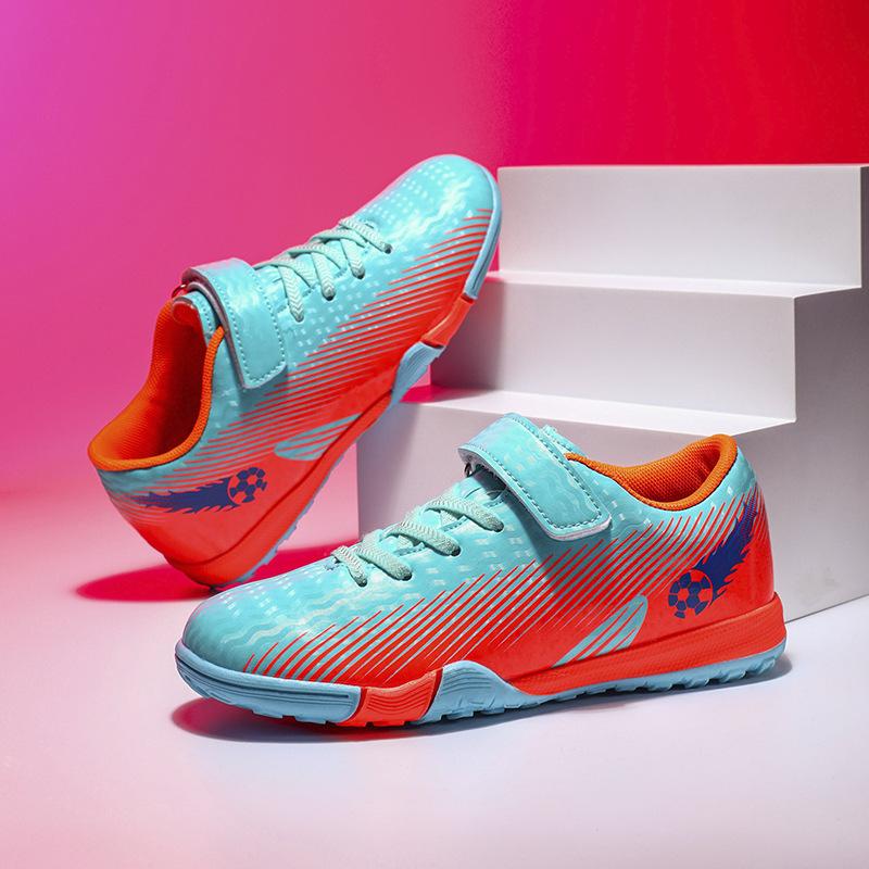 2025 new children's football shoes boys and students girls broken nails Velcro casual game sports shoes