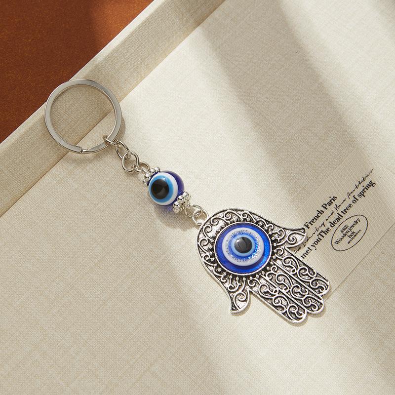 Teufelshand Schlüsselanhänger: Retro Ethnischer Lebensbaum-Anhänger mit blauem Auge