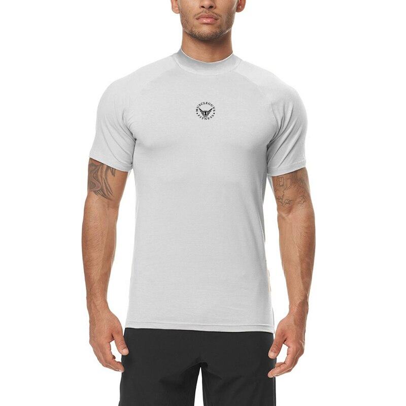 

Muscleguys Мужская фитнес Бодибилдинг Эластичная футболка Летняя Slim Fit Тренировка Короткий рукав M чёрный