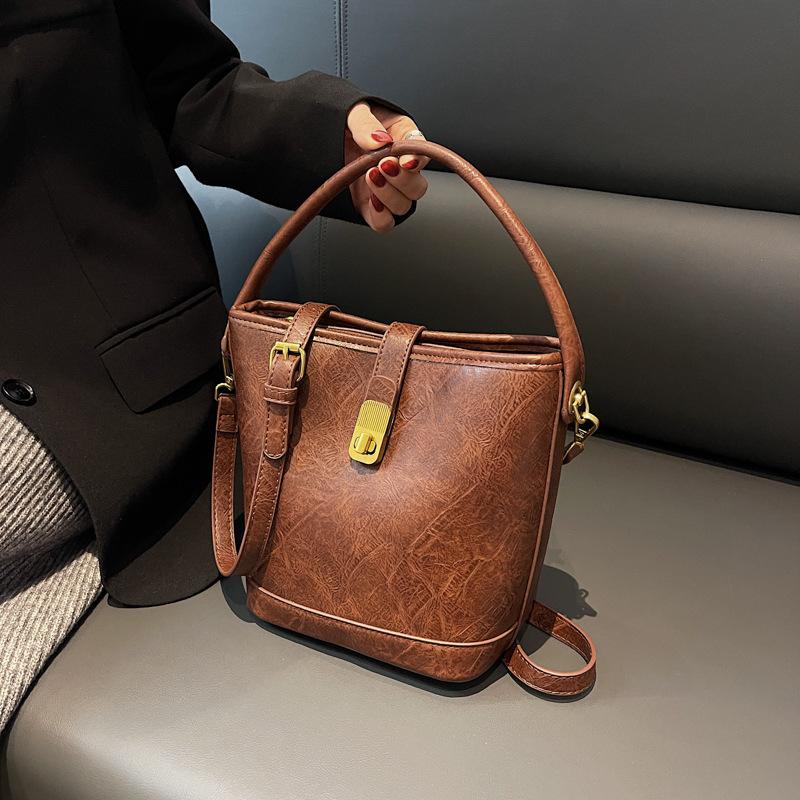 Trend bag oblique span bag women's fashion hand carrying bucket bag high-end light luxury women's bag large-capacity shoulder bag