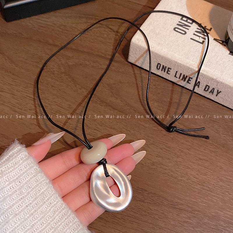 Korean geometric pendant necklace women's 2026 new light luxury long sweater chain accessories