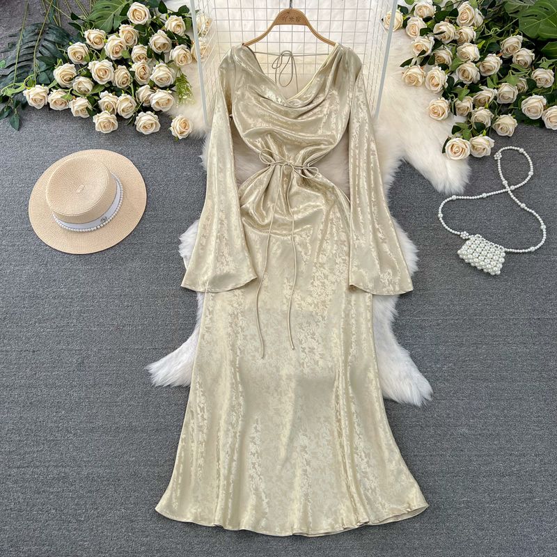 

Доступная роскошь Социальный деятель Рог Длинные рукава Расклешенное жаккардовое платье Champagne gold L