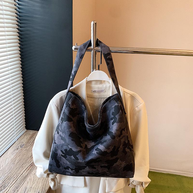 Casual large-capacity leopard print bag women's 2025 new commuter versatile shoulder bag slack tote bag bucket bag