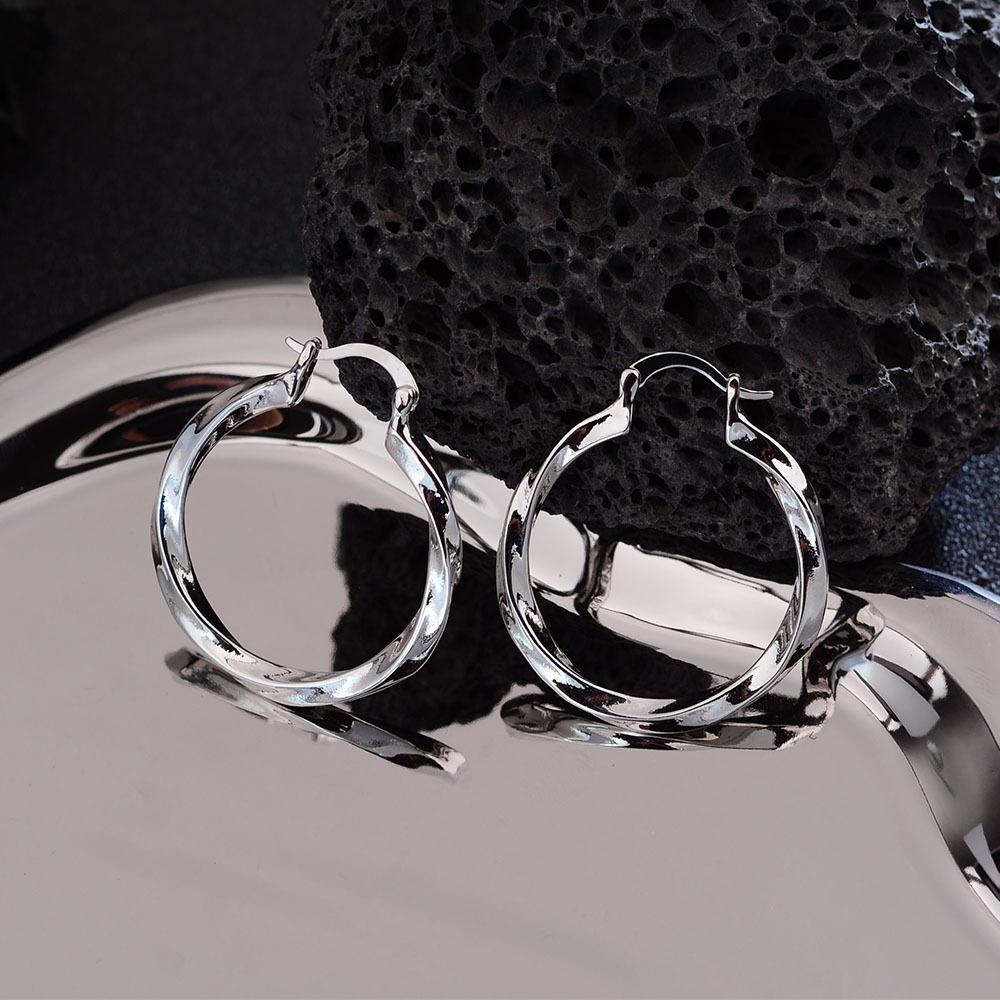 

Mobius Gold Earrings Women S Niche Twisted Texture Temperament High-End Ear Buckle Earrings
