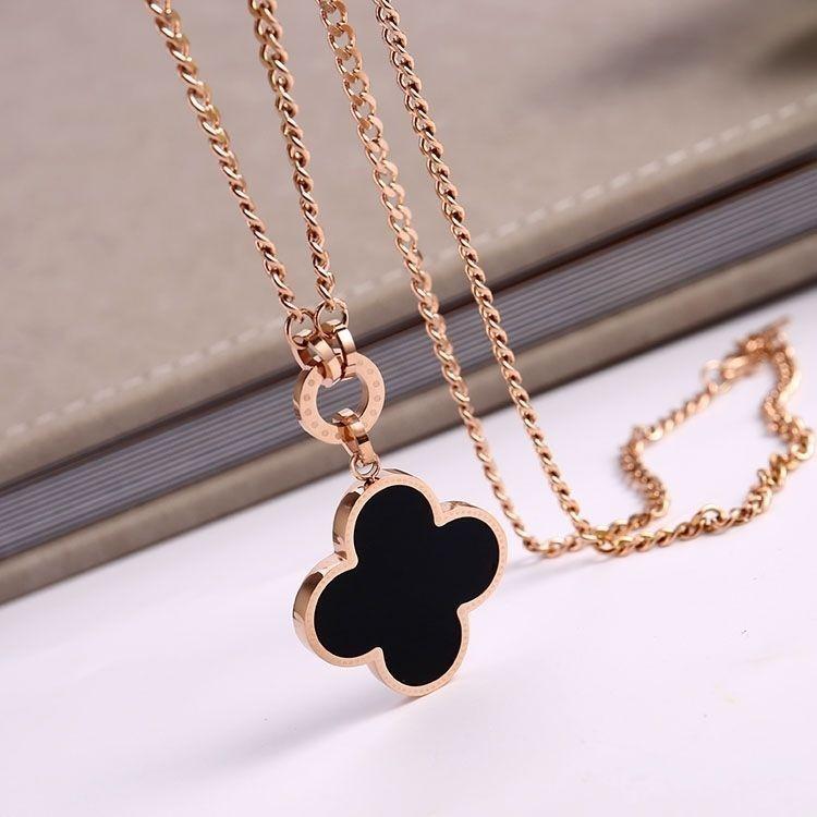 Stunning JMXD Titanium Steel Four Leaf Clover Pendant Sweater Chain Necklace High End Elegant Womens Fashion Jewelry Lucky Charm Gift Idea