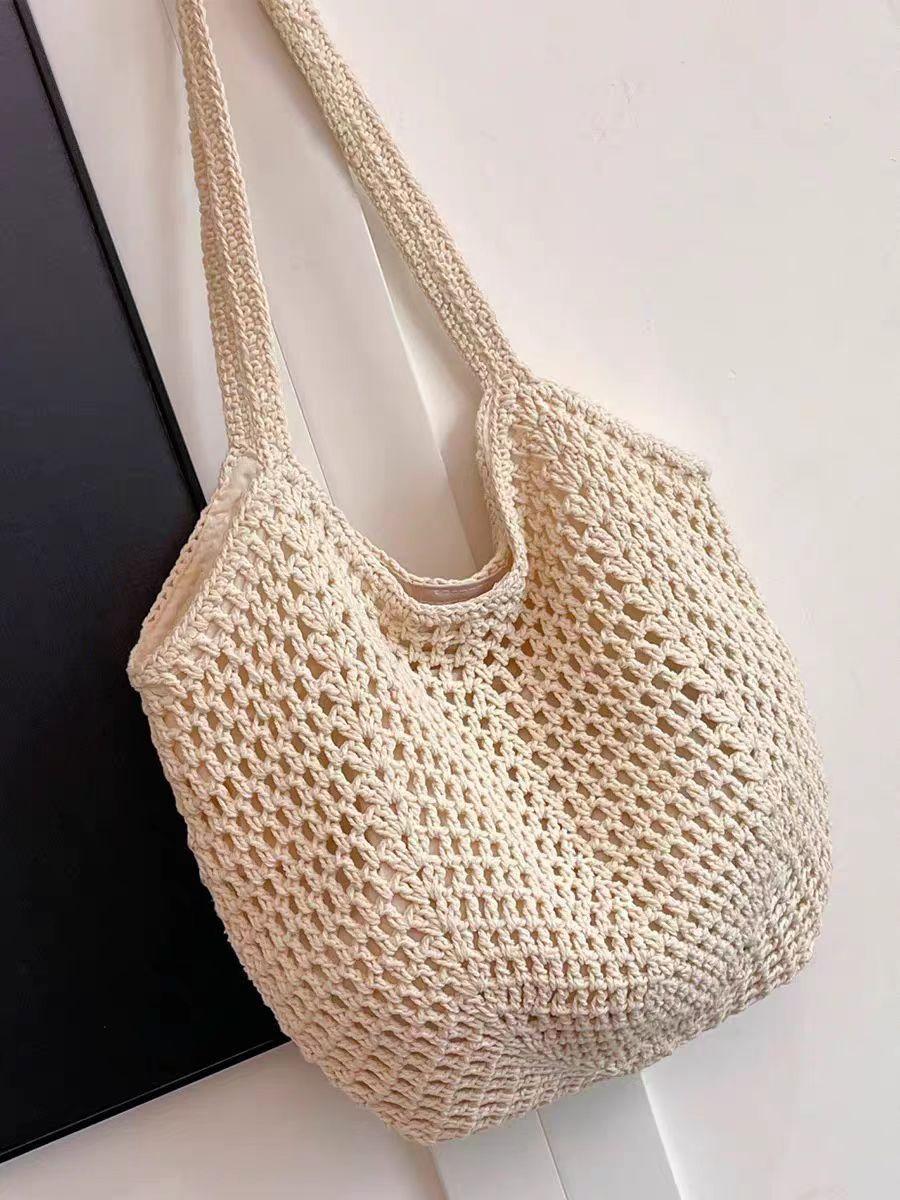 

Large-capacity casual hollow woven bag 2025 spring and summer new lazy wind vacation shoulder bag commuter tote bag