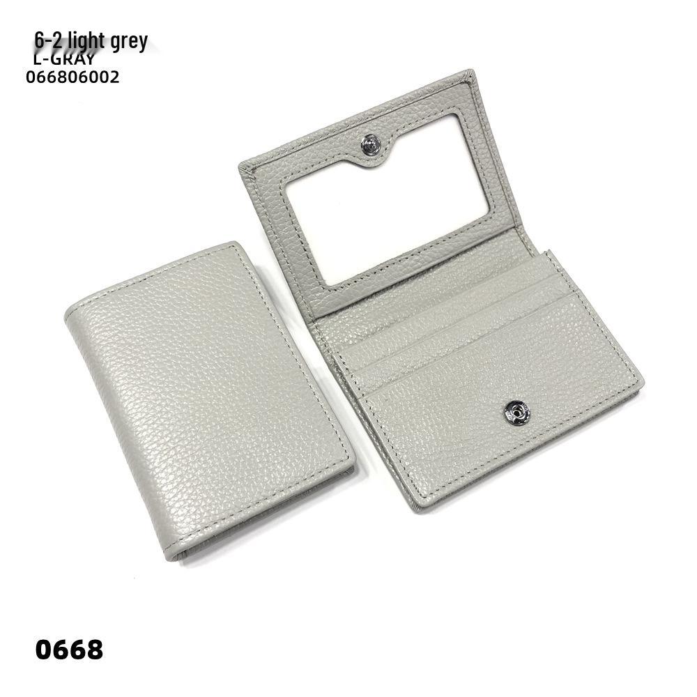 Premium Leather Card Holder: Unisex Cowhide Business Case with Mirror Window, Snap Closure & Coin Purse.