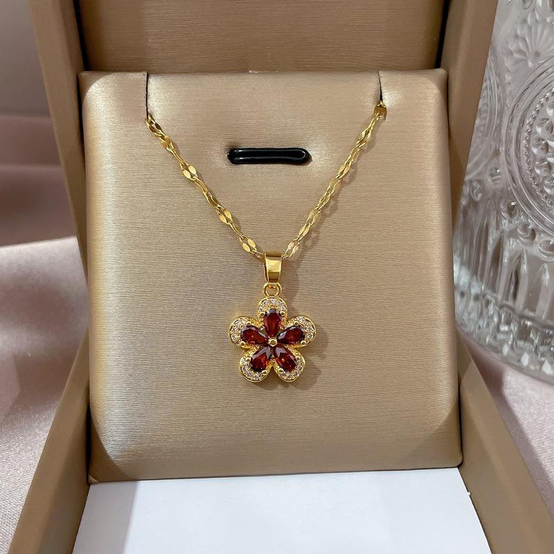 A Stylish Necklace Featuring a Five-Petal Flower Design Made of Stainless Steel, Available in a Vibrant Red Color, Suitable for Both Men And Women
