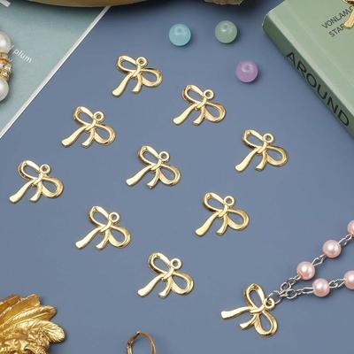 10/20/30 stücke DIY Material Schmuck Machen Bogen Anhänger Ohrringe Gold Bogen Stecker Anhänger DIY Halskette Material Legierung Retro Anhänger