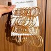 Boucles d'Oreilles Créoles Lisses Torsadées - Design Rétro, Finition Haut de Gamme, Style Niche Riz Sept Grains