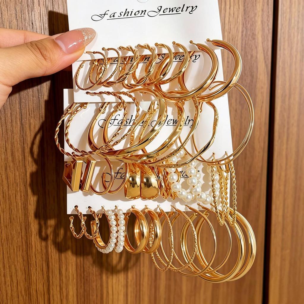 Boucles d'Oreilles Créoles Lisses Torsadées - Design Rétro, Finition Haut de Gamme, Style Niche Riz Sept Grains