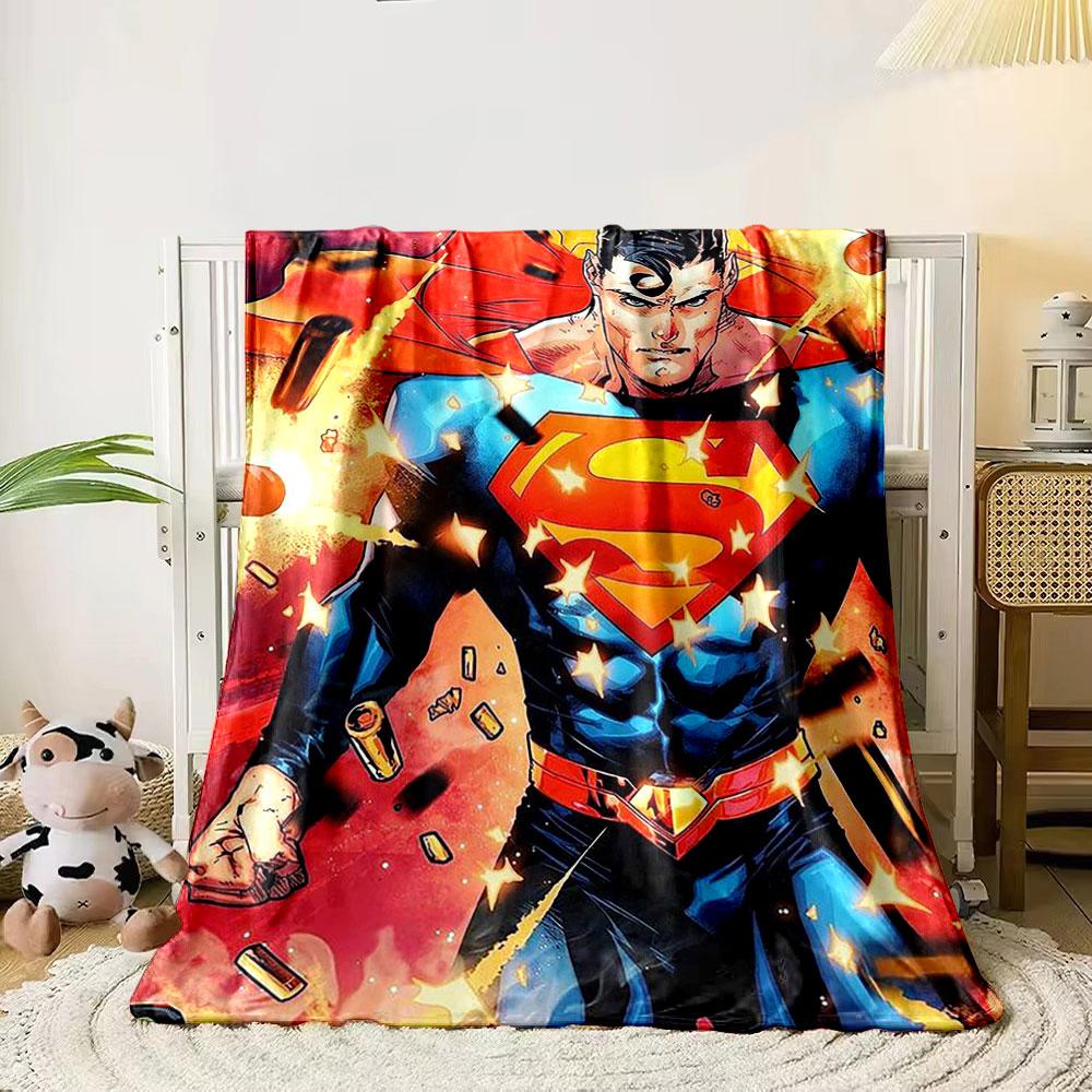 

Superhero in blue suit with red emblem surrounded by sparks and bullets. for all seasons blanket lunch break throw gift 80cm x 120cm