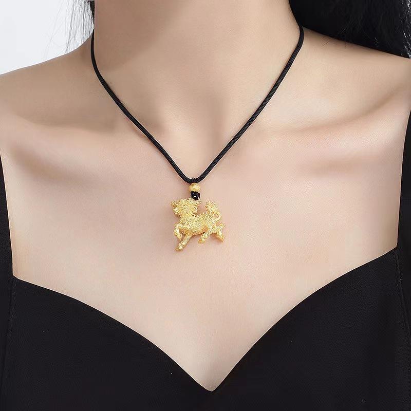 Gold Sand Fire Kirin Pendant: Auspicious Lucky Bead Charm with Matte Finish On Black Rope Jewelry.